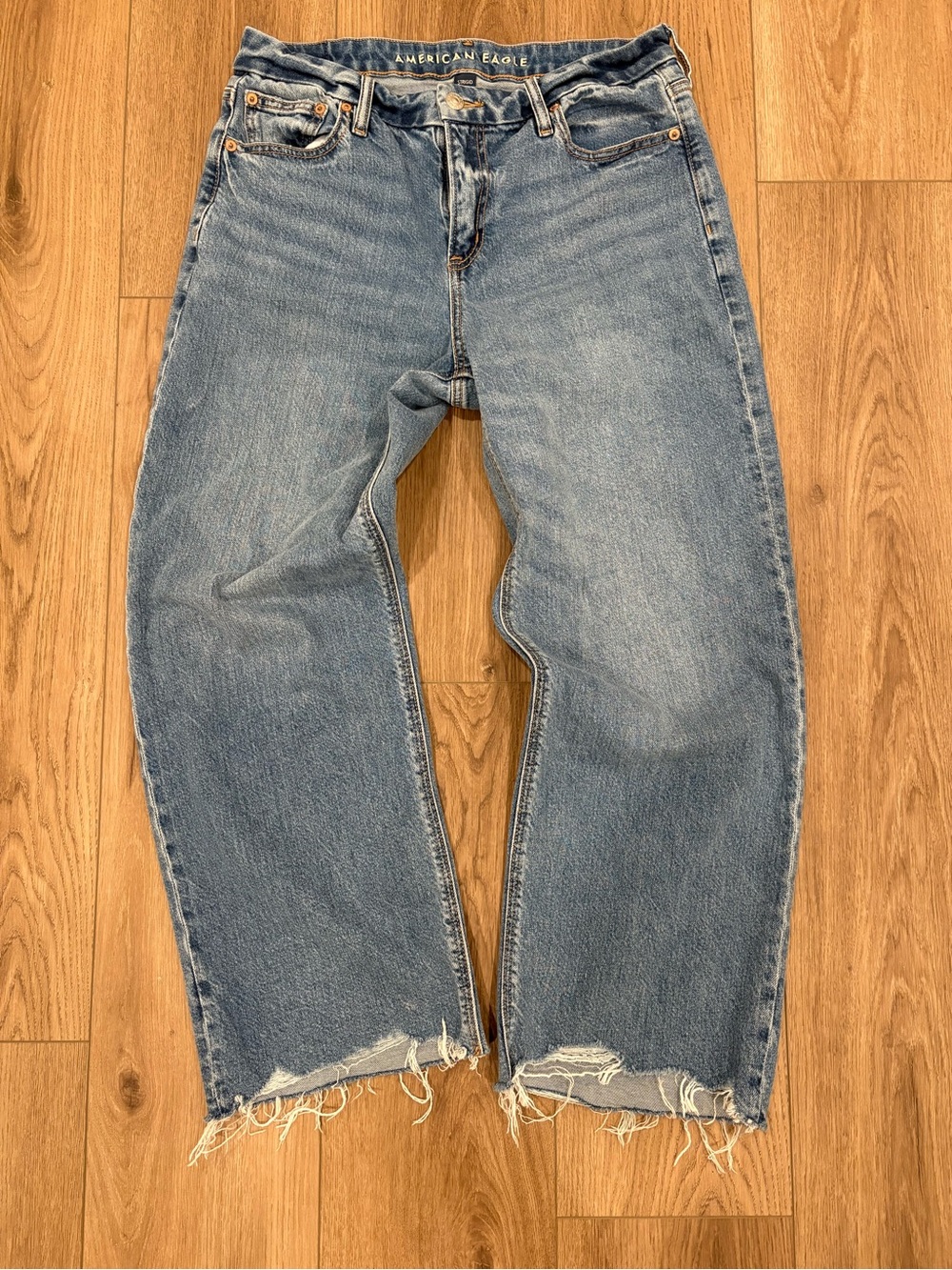 American Eagle Outfitters Straight Leg Jeans in Medium Blue Wash with Frayed Hem